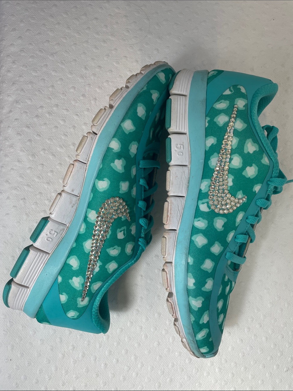 custom Nike Free 5.0 V4 NS aqua leopard print rhinestones on the swooshes. w8.5